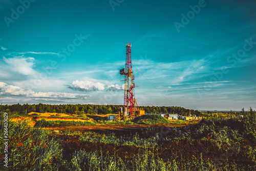 Land oil drilling rig blue sky
