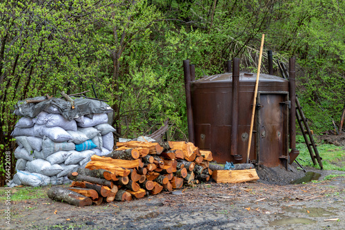 Fototapeta Naklejka Na Ścianę i Meble -  Old kilns for firing charcoal in Central Europe. A simple method of obtaining black gold.