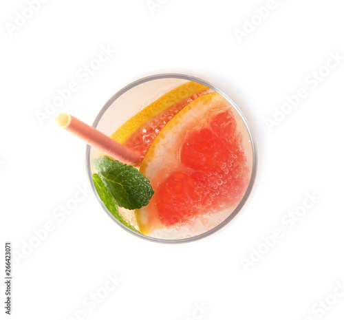 Glass of grapefruit cocktail isolated on white, top view