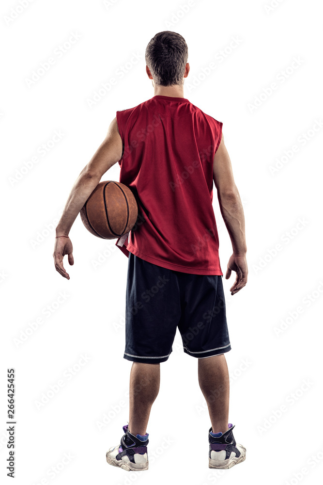 Basketball player standing back to camera with ball in hand isolated on white background