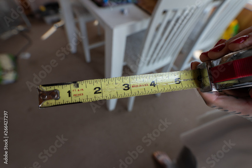 tape measure says six inches photo