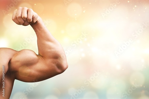Cropped image of bodybuilder showing muscles