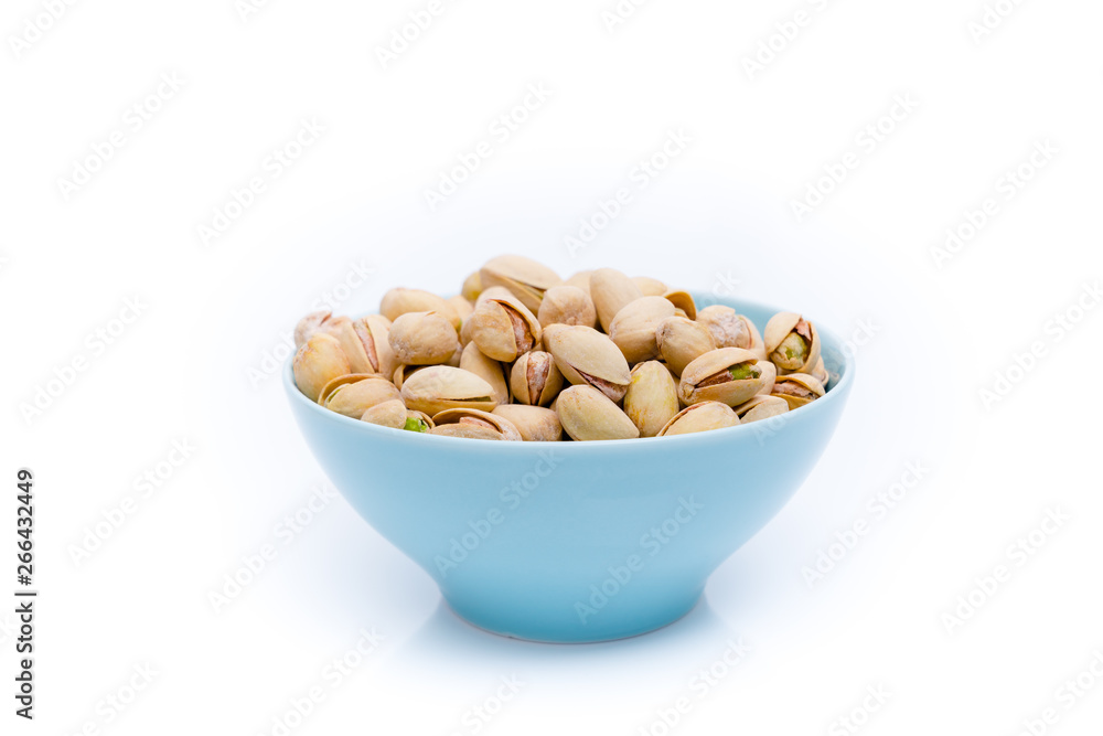 Pistachios in bowls. Roasted pistachio seeds Pistachios in bowls. Roasted pistachio seeds