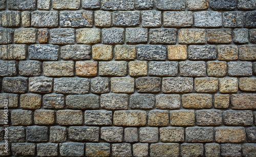 old stone wall closeup for background