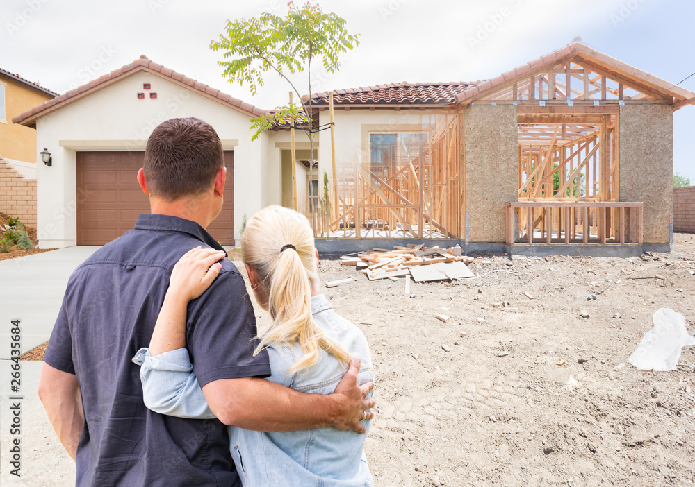 Couple Facing Construction Framing Gradating To Completed Home Couple Facing Construction Framing Gradating To Completed Home