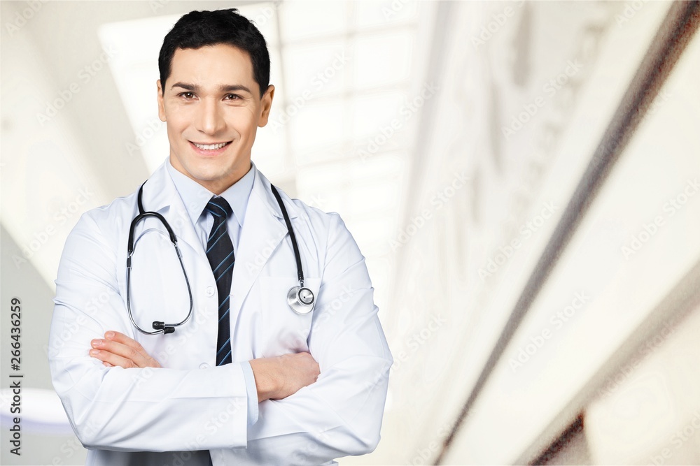 Young beautiful nurse on blurred hospital background Young beautiful nurse on blurred hospital background