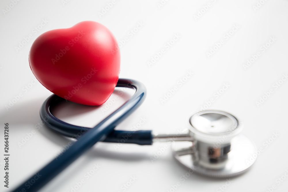 Red heart with stethoscope on white background Red heart with stethoscope on white background