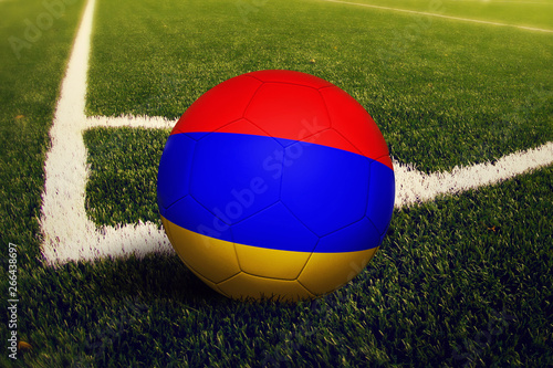 Armenia ball on corner kick position  soccer field background. National football theme on green grass.