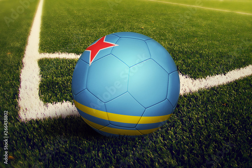 Aruba ball on corner kick position  soccer field background. National football theme on green grass.