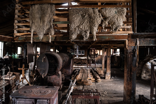 Wool and wood inside a shearing shed photo