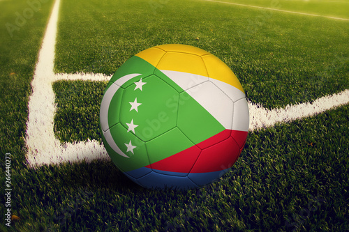 Comoros ball on corner kick position  soccer field background. National football theme on green grass.