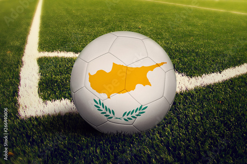 Cyprus ball on corner kick position  soccer field background. National football theme on green grass.