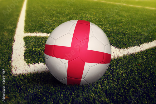 England ball on corner kick position  soccer field background. National football theme on green grass.
