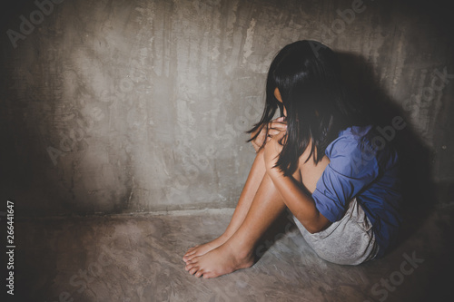 Violent criminals with children.man holding timber hit victims in abandoned building.concept for stop abusing violence.kidnapping, A fearful child, Human Rights