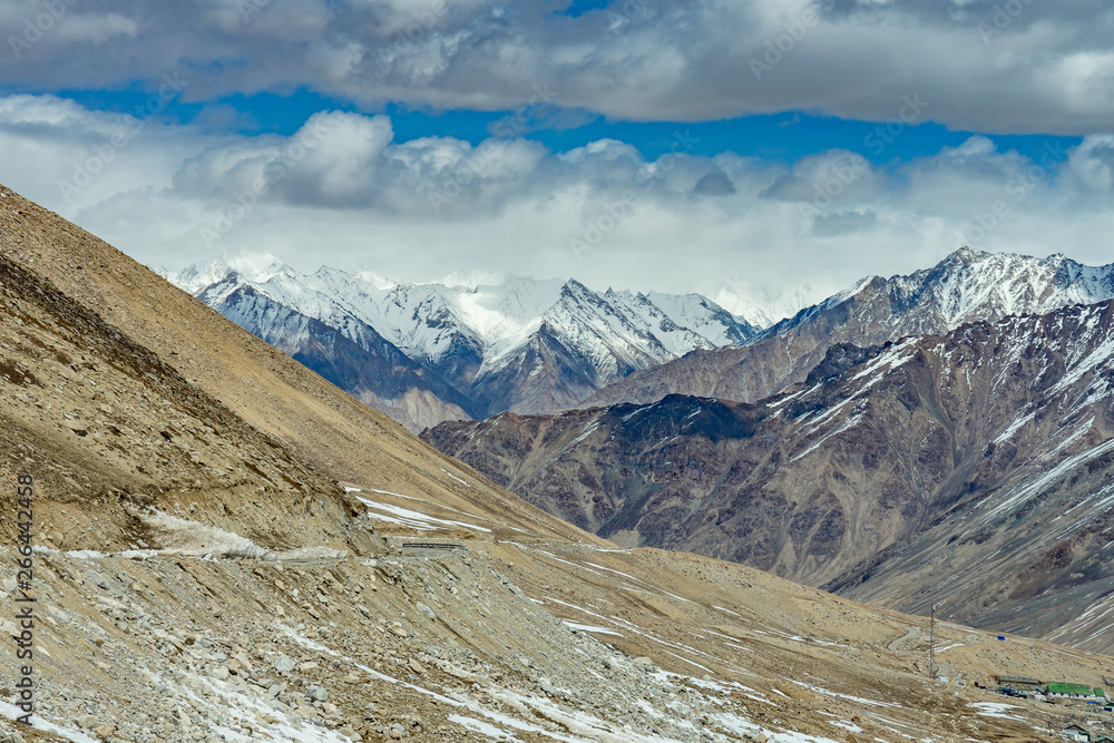Khardung La pass, India. Khardung La is a high mountain pass located in the Ladakh region of the Indian state of Jammu and Kashmir. The elevation of Khardung La is 5,359 m