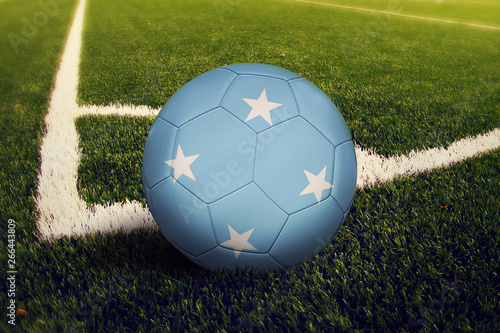 Micronesia ball on corner kick position  soccer field background. National football theme on green grass.