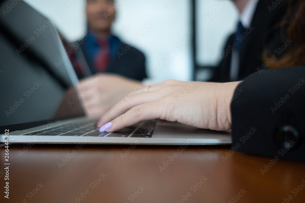 young businesswoman working with mobile laptop and documents in office, business concept young businesswoman working with mobile laptop and documents in office, business concept