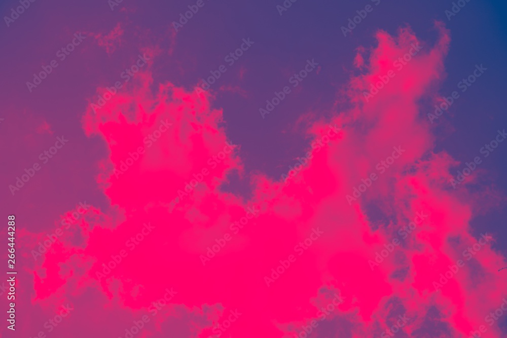 abstract pink background. Pink sky with white clouds.