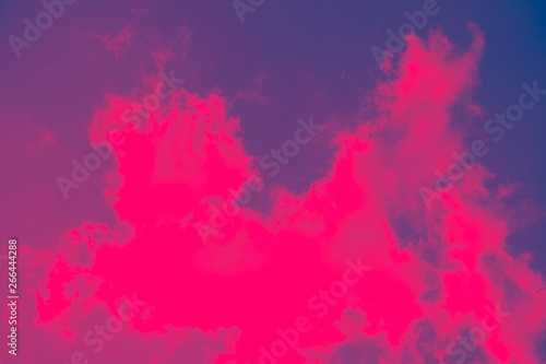 abstract pink background. Pink sky with white clouds.
