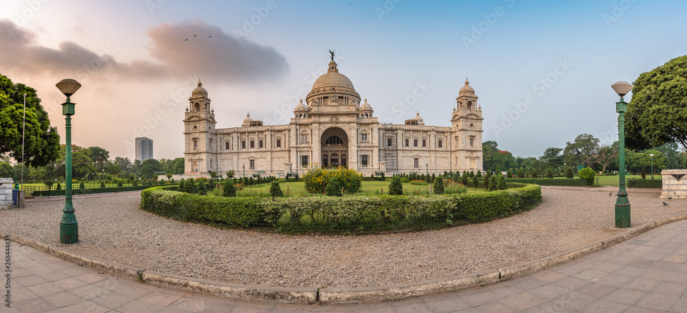 Panoramic Front view of Victoria Memorial with beautiful garden,at the time of Sunrise.