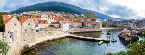 Panoramic view of Dubrovnik West Pier and medieval fortifications of the city seen from Fort Lovrijenac