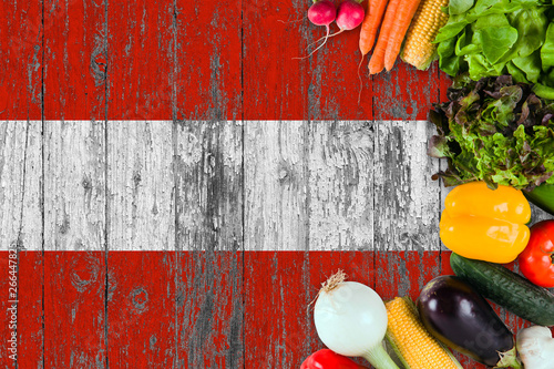 Fototapeta Naklejka Na Ścianę i Meble -  Fresh vegetables from Austria on table. Cooking concept on wooden flag background.