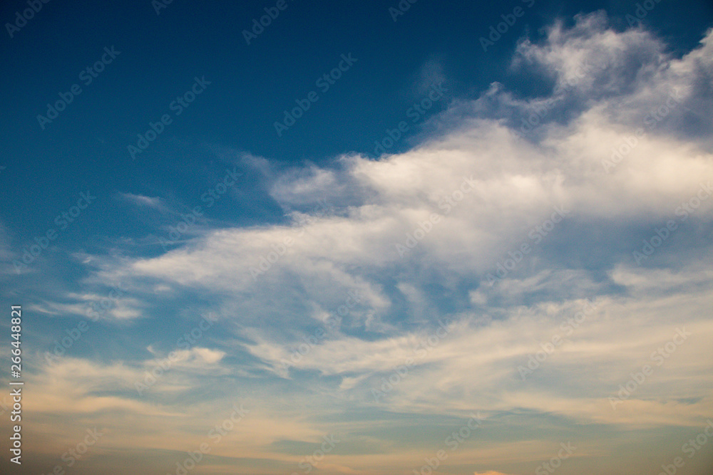 Deep blue sky and white cloud background.Beautiful sky of cirrus clouds.