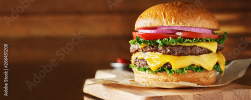 Fotografie, Tablou double cheeseburger with lettuce, tomato, onion, and melted american cheese with