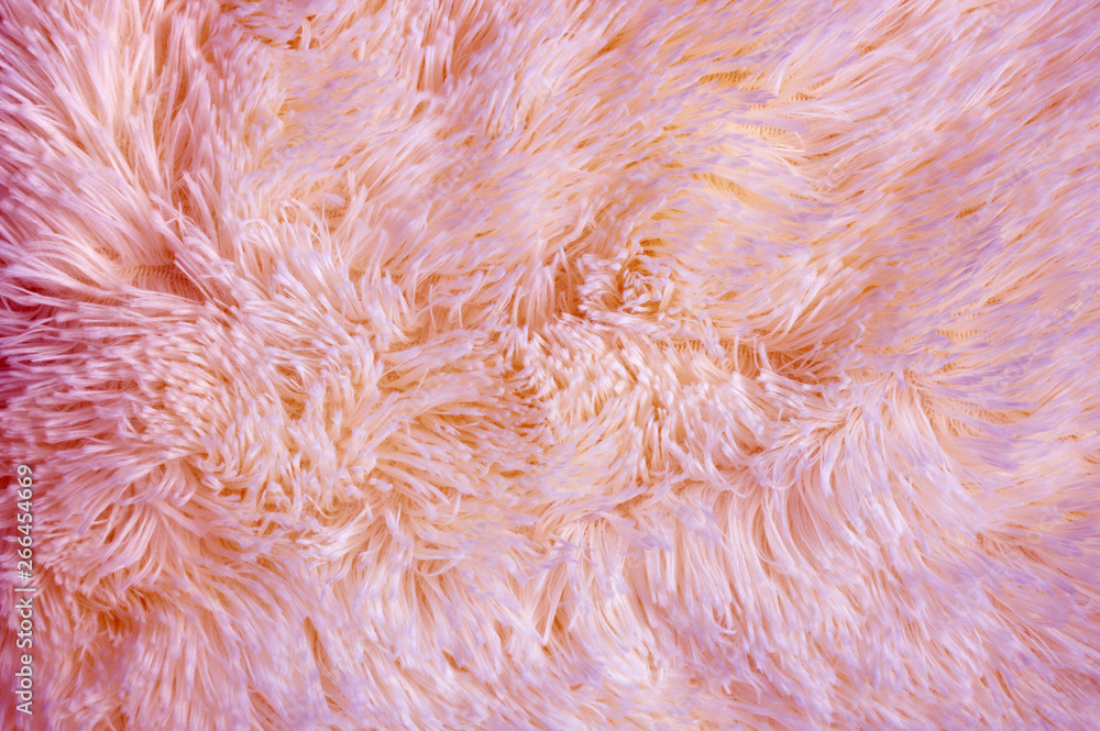 Fototapeta premium Pink colored fluffy fake fur texture