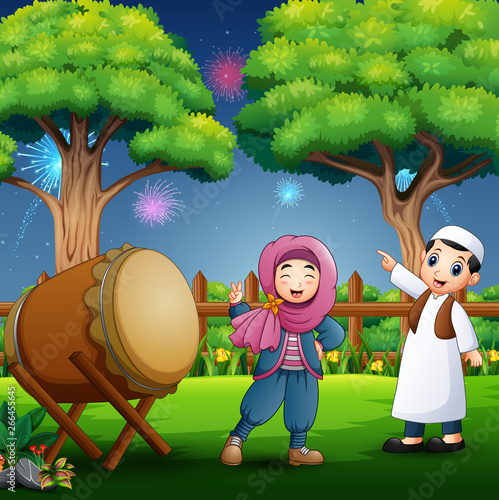 Fototapeta Naklejka Na Ścianę i Meble -  Young Muslim Boy and Girl Celebrating Ramadan