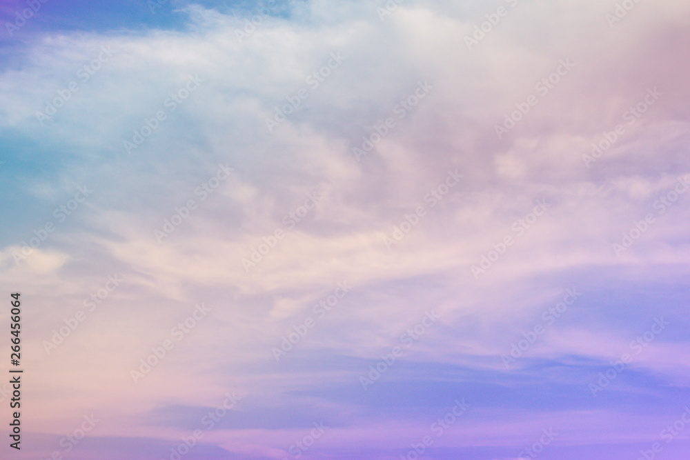 Obraz premium Beautiful sky and clouds in soft pastel color.Soft cloud in the sky background colorful pastel tone.