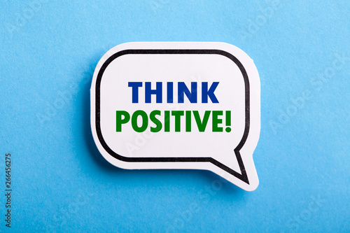Think Positive Speech Bubble Isolated On Blue Background