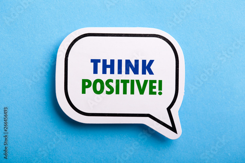 Think Positive Speech Bubble Isolated On Blue Background