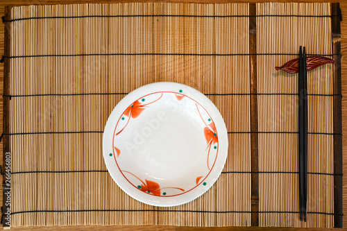 Placemat with plate and chopsticks (Japanese style)