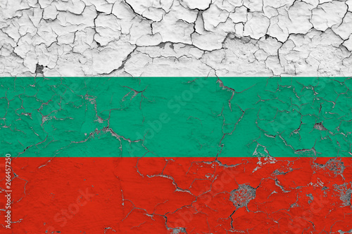Flag of Bulgaria painted on cracked dirty wall. National pattern on vintage style surface.