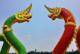 colorful naga statue in Thai culture with blue sky bakground