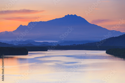 Majestic Mount Kinabalu with beautiful Twilight Sunrise and amazing sky clouds, Tuaran,Sabah,Borneo (Soft Focus) © alenthien