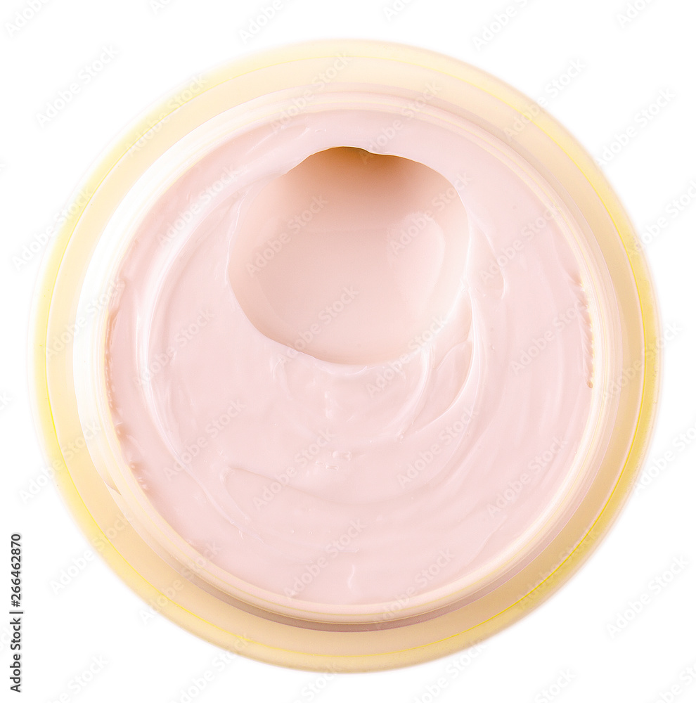 The jar with a female face cream on white The jar with a female face cream on white