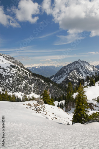 Beautiful view on Austrian Alps covered with snow on sunny day in springtime in Tyrol region.