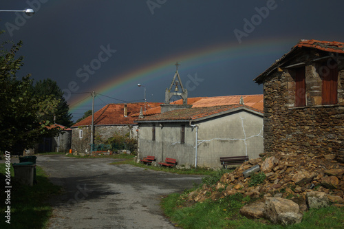 rainbow over church, ourense, spain