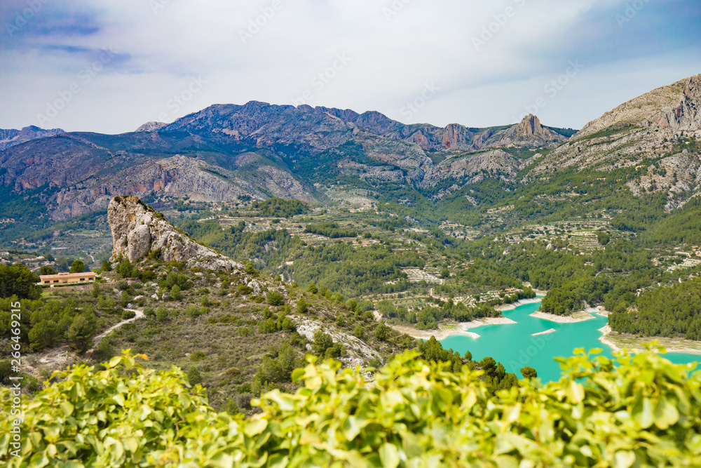 Panoramic view to beautiful landscape in mountain village Guadalest, Spain.