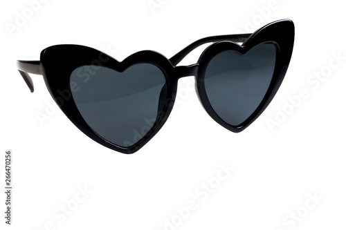 Black heart shaped sunglasses on a white background.