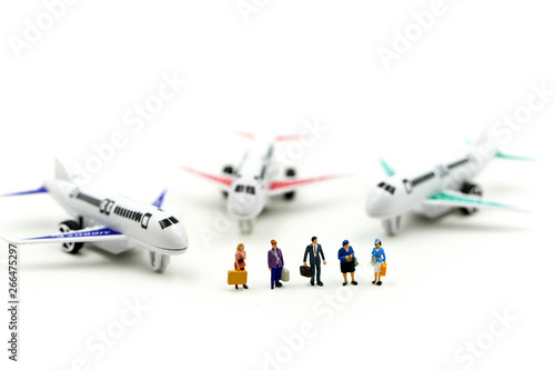 Miniature people : with airplane ,Transportation, traveling or business trip concepts.