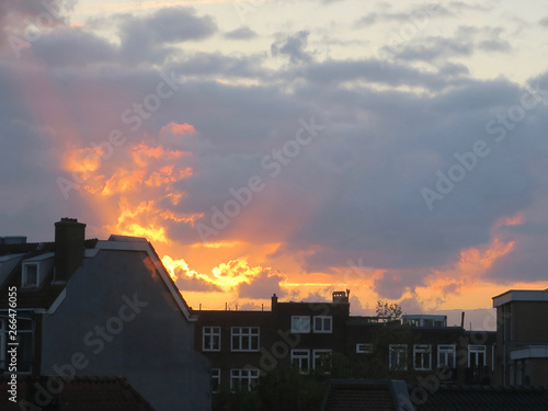 sunset inf fire above some houses in Amsterdam West The Nethterlands photo