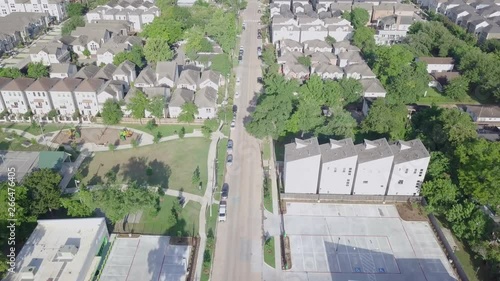 Flyover of residential street in Houston photo