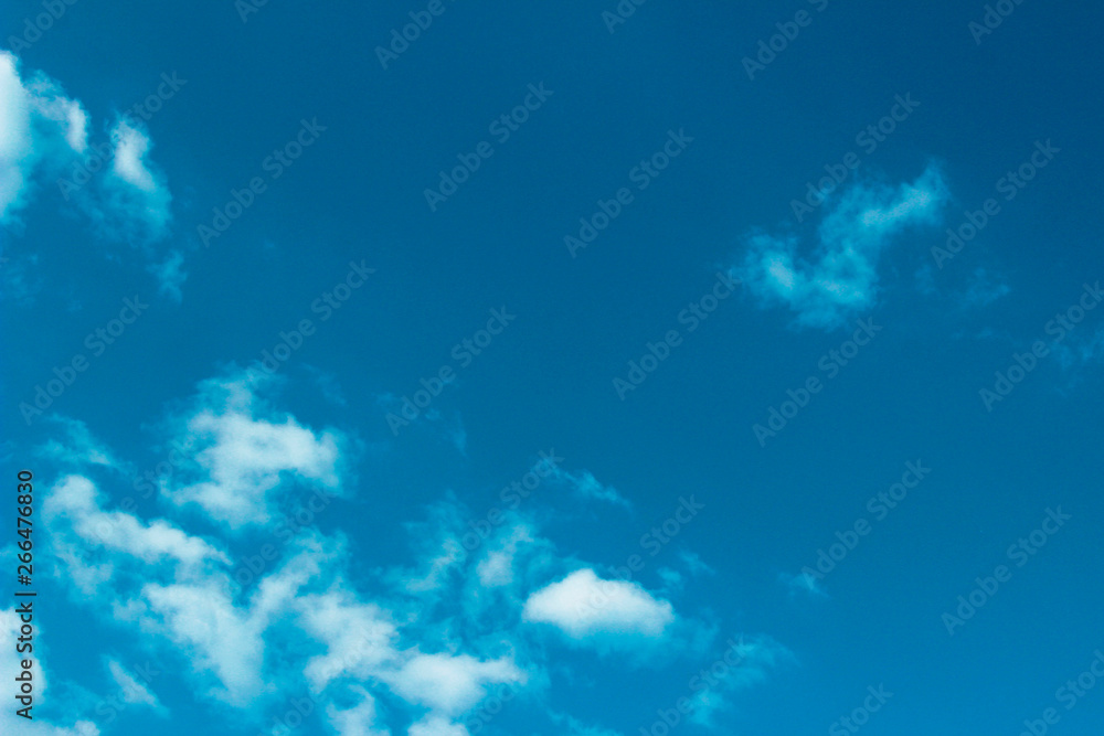 White Clouds Over Blue Sky Background. Nature, Landscape Concept. Beautiful Nature Background.