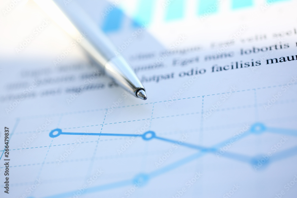 Financial statistics documents ball pen infographics at office table closeup. Internal Revenue Service inspector sum check investigation exchange market earnings savings loan and credit concept Financial statistics documents ball pen infographics at office table closeup. Internal Revenue Service inspector sum check investigation exchange market earnings savings loan and credit concept