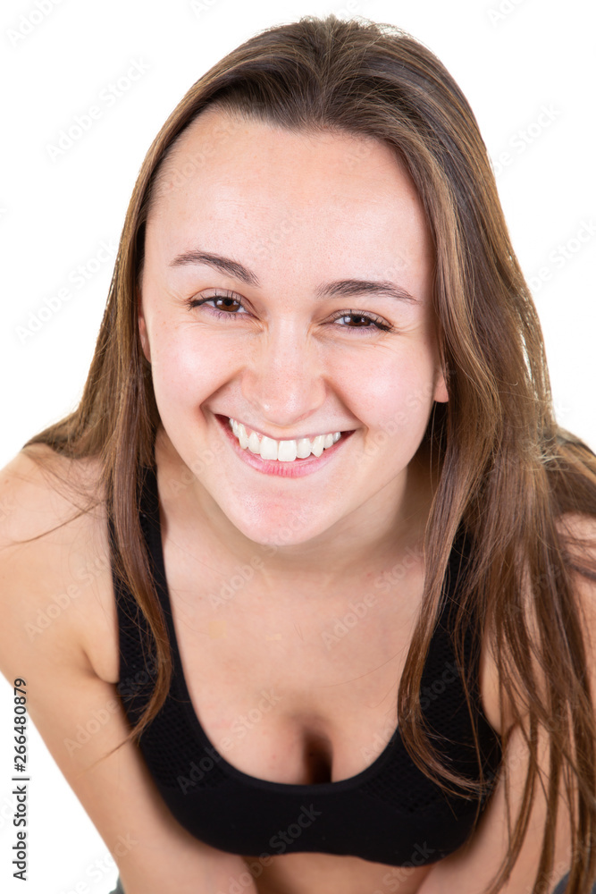 sport portrait of a young happy woman smiling on white background sport portrait of a young happy woman smiling on white background