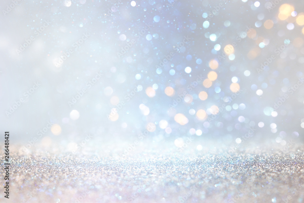 glitter silver and gild lights background. de-focused glitter silver and gild lights background. de-focused