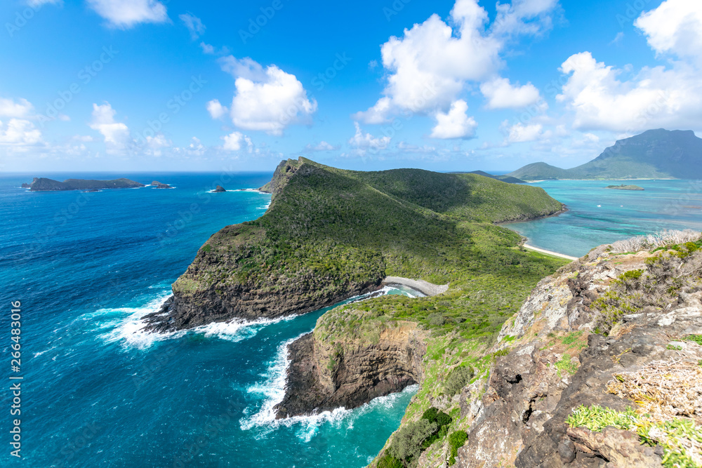 View of the north coast of Lord Howe Island, New South Wales, Australia, seen from the summit of Mount Eliza. Malabar Hill in the background. Lord Howe Island is a popular tourist destination.